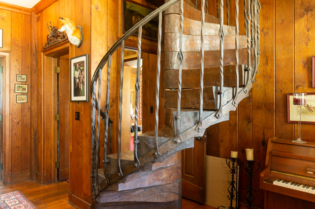 Contemporary photograph of staircase to guest rooms at Daisy Hill Gatehouse and garden