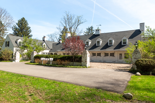 Contemporary photograph of garages converted to residences at Roundwood Manor, 3450 Roundwood Road