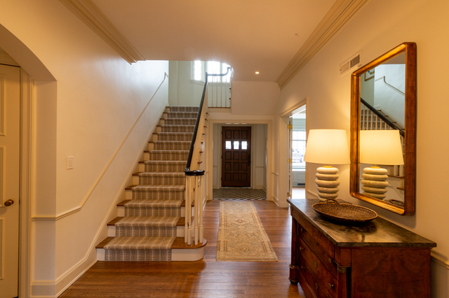 Contemporary photograph of center hall of Van Sweringen Gatehouse, 17715 Shaker Boulevard